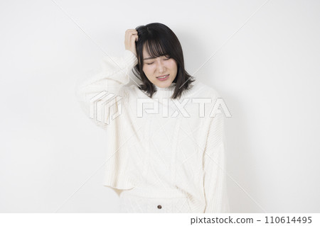 A young woman with a headache 110614495