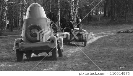 Soviet Russian Armored Combat Vehicle And Soviet Troops On Motorcycles With Sidecars. Soviet World War Ii Automotive. Black And White 110614975