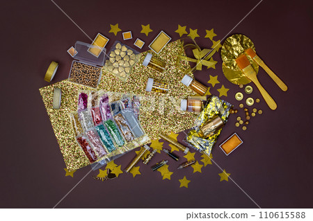 Gold stationery and party decorations in gold tones. Gold stationery and party decorations in gold tones. 110615588