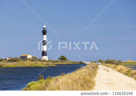 lighthouse Faraman, Salin de Giraud, Provence-Alpes-Cote d'Azur, France lighthouse Faraman, Salin de Giraud, Provence-Alpes-Cote d'Azur, France 110616198