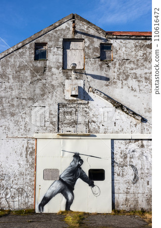 Graffiti on an abandoned house, Reydarfjordur, Iceland 110616472