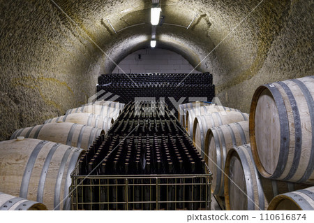 Wine cellars with barrels, traditional wine called Bikaver near Eger, Hungary 110616874