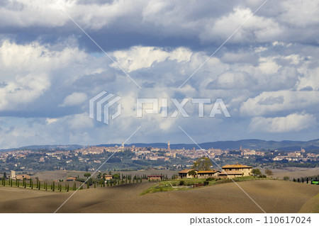 Typical Tuscan landscape withr Siena town, Tuscany, Italy Typical Tuscan landscape withr Siena town, Tuscany, Italy 110617024