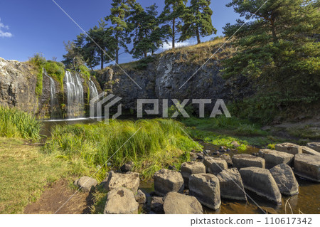 Waterfall Cascade des Veyrines near Allanche in French highlands, Auvergne, Cantal, France Waterfall Cascade des Veyrines near Allanche in French highlands, Auvergne, Cantal, France 110617342