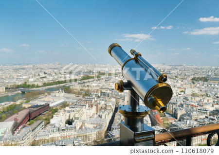 Monocle or tourist telescope on the observation deck with cityscape 110618079