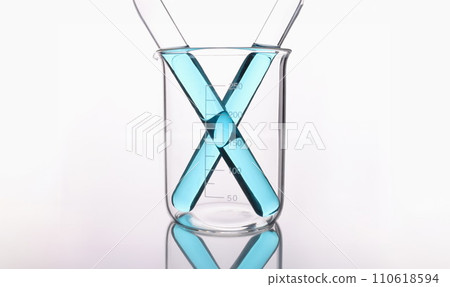 Two test tubes with unprotected liquid in a glass beaker 110618594