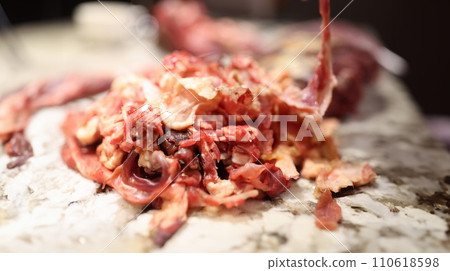Closeup of substandard meat scraps for animal feed production 110618598