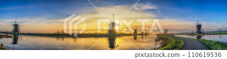 Rotterdam Netherlands, sunrise panorama nature landscape of Dutch Windmill at Kinderdijk Village Rotterdam Netherlands, sunrise panorama nature landscape of Dutch Windmill at Kinderdijk Village 110619536