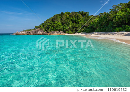 Tropical islands view of ocean blue sea water and white sand beach at Similan Islands, Phang Nga Thailand nature landscape Tropical islands view of ocean blue sea water and white sand beach at Similan Islands, Phang Nga Thailand nature landscape 110619582
