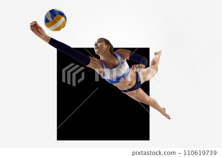 Young woman, beach volleyball player in motion during game, hitting ball over white background with blue element. Young woman, beach volleyball player in motion during game, hitting ball over white background with blue element. 110619739