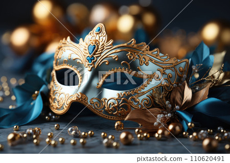 Blue and gold Venetian carnival mask with feathers, copy space Blue and gold Venetian carnival mask with feathers, copy space 110620491