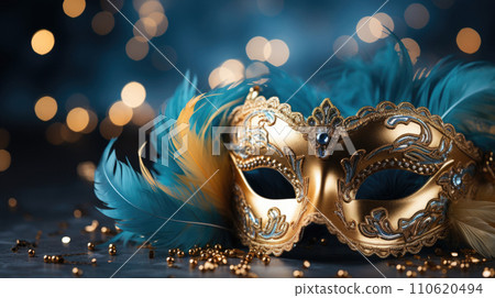 Blue and gold Venetian carnival mask with feathers, copy space Blue and gold Venetian carnival mask with feathers, copy space 110620494