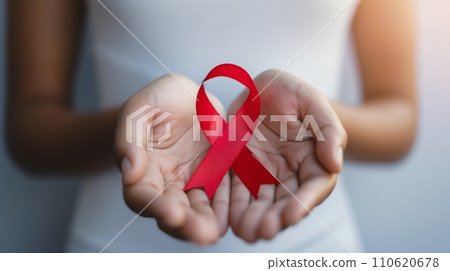 一名手持紅絲帶呼籲預防愛滋病的婦女:人工智慧的工作 一名手持紅絲帶呼籲預防愛滋病的婦女:人工智慧的工作 110620678