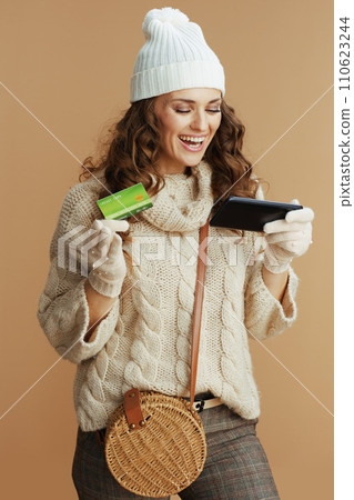happy stylish woman making online shopping on e-commerce site happy stylish woman making online shopping on e-commerce site 110623244