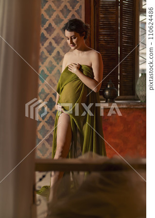 pregnant woman wrapped in cloth pregnant woman wrapped in cloth 110624486