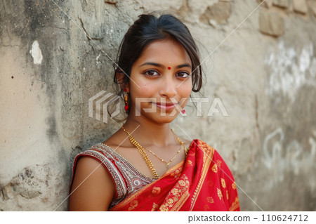 portrait of a young beautiful indian woman with sari 110624712