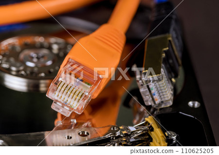 Digital backup is performed using ethernet cables connected to internet to backup files to an online database storage facility 110625205