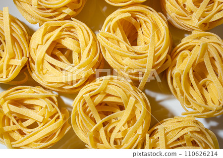 Uncooked Egg-Based Fettuccine Pasta Uncooked Egg-Based Fettuccine Pasta 110626214
