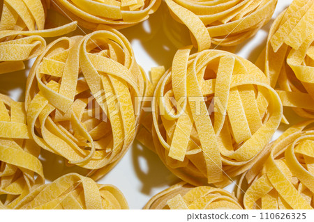 Uncooked Egg-Based Fettuccine Pasta Uncooked Egg-Based Fettuccine Pasta 110626325