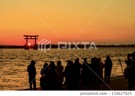 People watching the sunset over Otorii Gate of Lake Hamana, Hamamatsu City People watching the sunset over Otorii Gate of Lake Hamana, Hamamatsu City 110627825