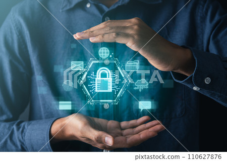 Businessman holding cyber security icons screen. Digital information technology and cyber security concept. 110627876