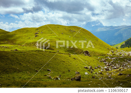 landscape with hills, clouds and rocks 110630017
