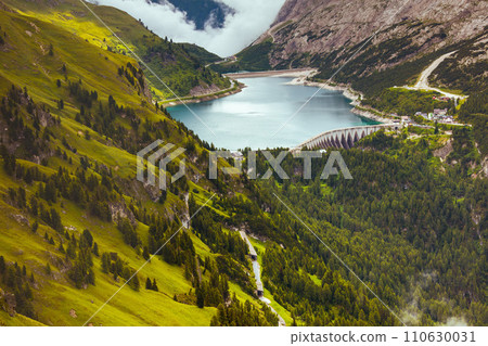 landscape with hills, Fedaia lake and forest 110630031