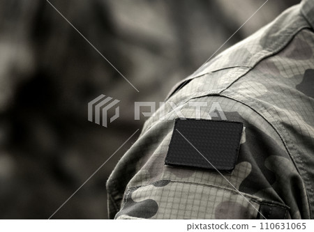 Anarchism flag on military uniform. Black flag is the traditional anarchist symbol. 110631065