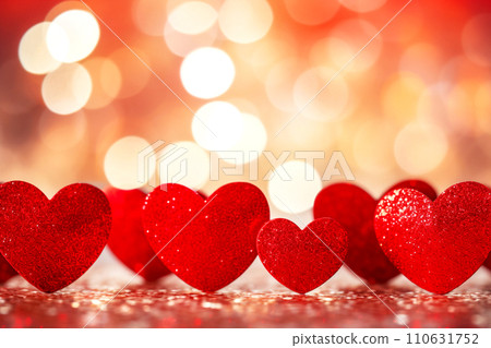 AI-generated content. Red hearts on a blurred background with romantic bokeh. Valentine's Day concept. 110631752