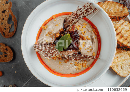 Mushroom cream soup on dark background. Champignon soup Mushroom cream soup on dark background. Champignon soup 110632669