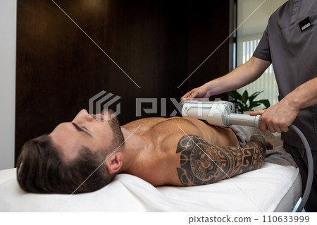 Man having procedures in a beauty salon 110633999