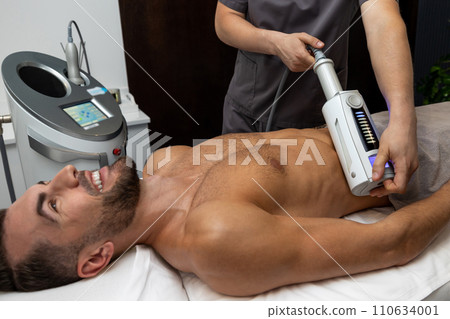Man having procedures in a beauty salon 110634001