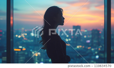 AI image of a woman looking at the city from her office window 110634570