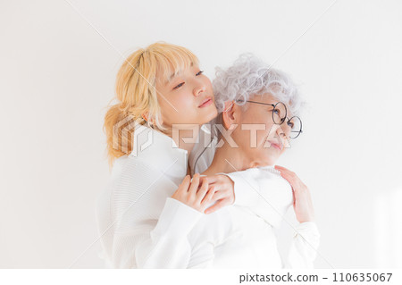 Family portrait of young woman and senior woman Family portrait of young woman and senior woman 110635067