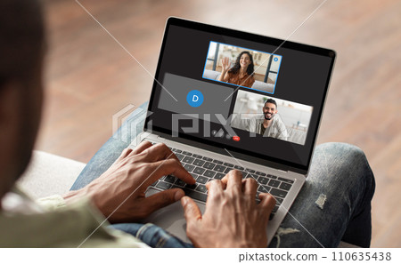 High angle view man have video chat with multiracial people 110635438