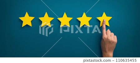 Woman hand showing on five star excellent rating 110635455