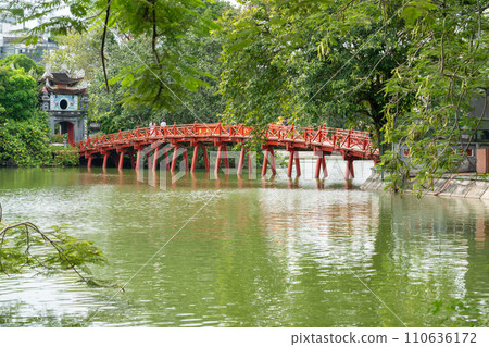 Red bridge to Ngoc Son Temple, Ngoc Son Island, in Hoan Kiem Lake, Hanoi, Vietnam 110636172