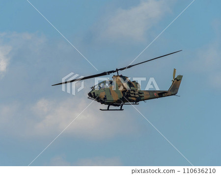 Anti-tank helicopter AH-1S Cobra in flight Anti-tank helicopter AH-1S Cobra in flight 110636210