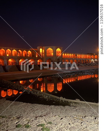 Isfahan's Harj Bridge reflected in the water at night Isfahan's Harj Bridge reflected in the water at night 110637016