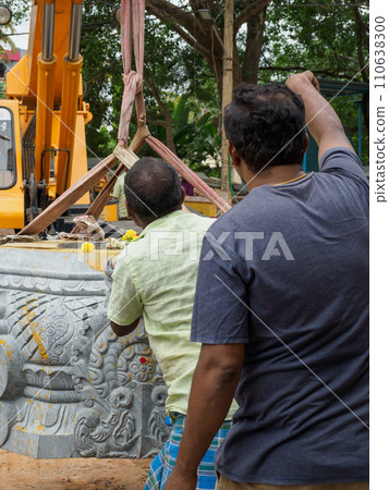 India_ Installation of stones for building a temple 110638300