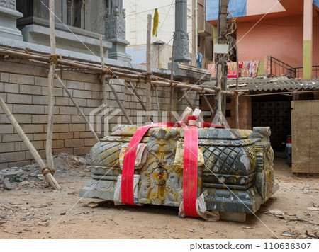 India_ Installation of stones for building a temple 110638307
