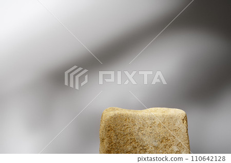 Stone podium mockup against gray background copy space Stone podium mockup against gray background copy space 110642128