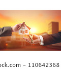 conceptual image with hand holding house model 110642368