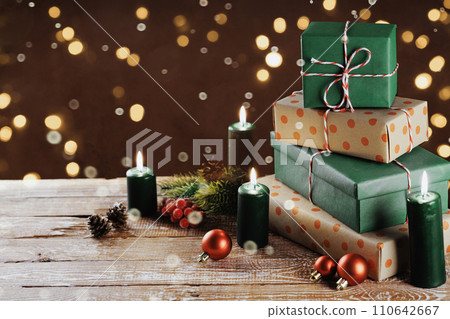 Christmas gift boxes with decoration on the table Christmas gift boxes with decoration on the table 110642667