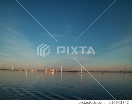 Offshore wind power generation floating on the Baltic Sea like a lake 110643842