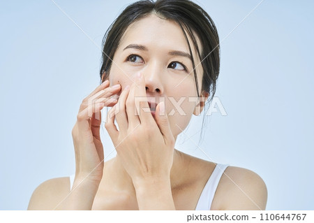 A woman worried about skin problems A woman worried about skin problems 110644767