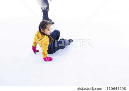 Girls enjoying ice skating 110645298