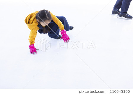 Girls enjoying ice skating Girls enjoying ice skating 110645300