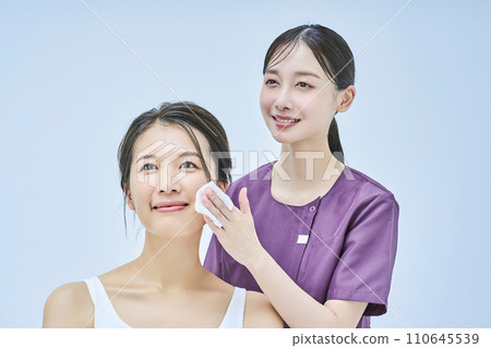 A woman being counseled by a female beauty staff member A woman being counseled by a female beauty staff member 110645539