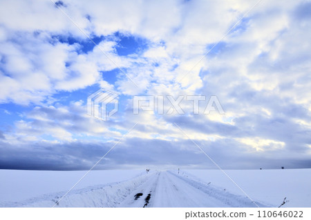 Scenery of winter road in Hokkaido with many clouds Scenery of winter road in Hokkaido with many clouds 110646022